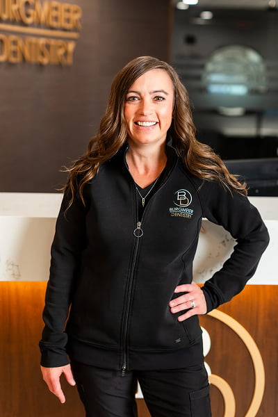 Sarah Scheduling Coordinator Dental Assistant at Burgmeier Dentistry in Mason City smiling in her black uniform