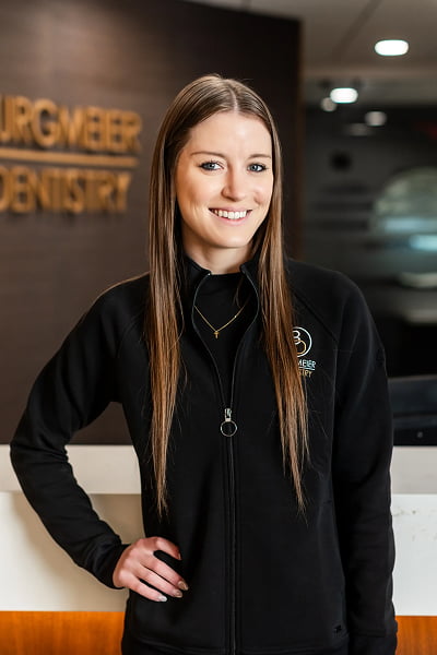 Taylor Dental Assistant at Burgmeier Dentistry in Mason City smiling in her black uniform
