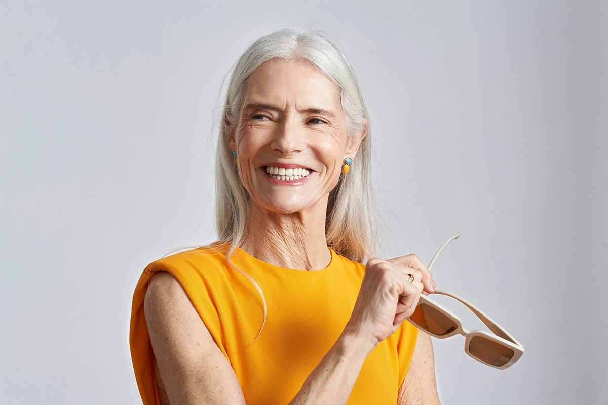 An older woman with glasses